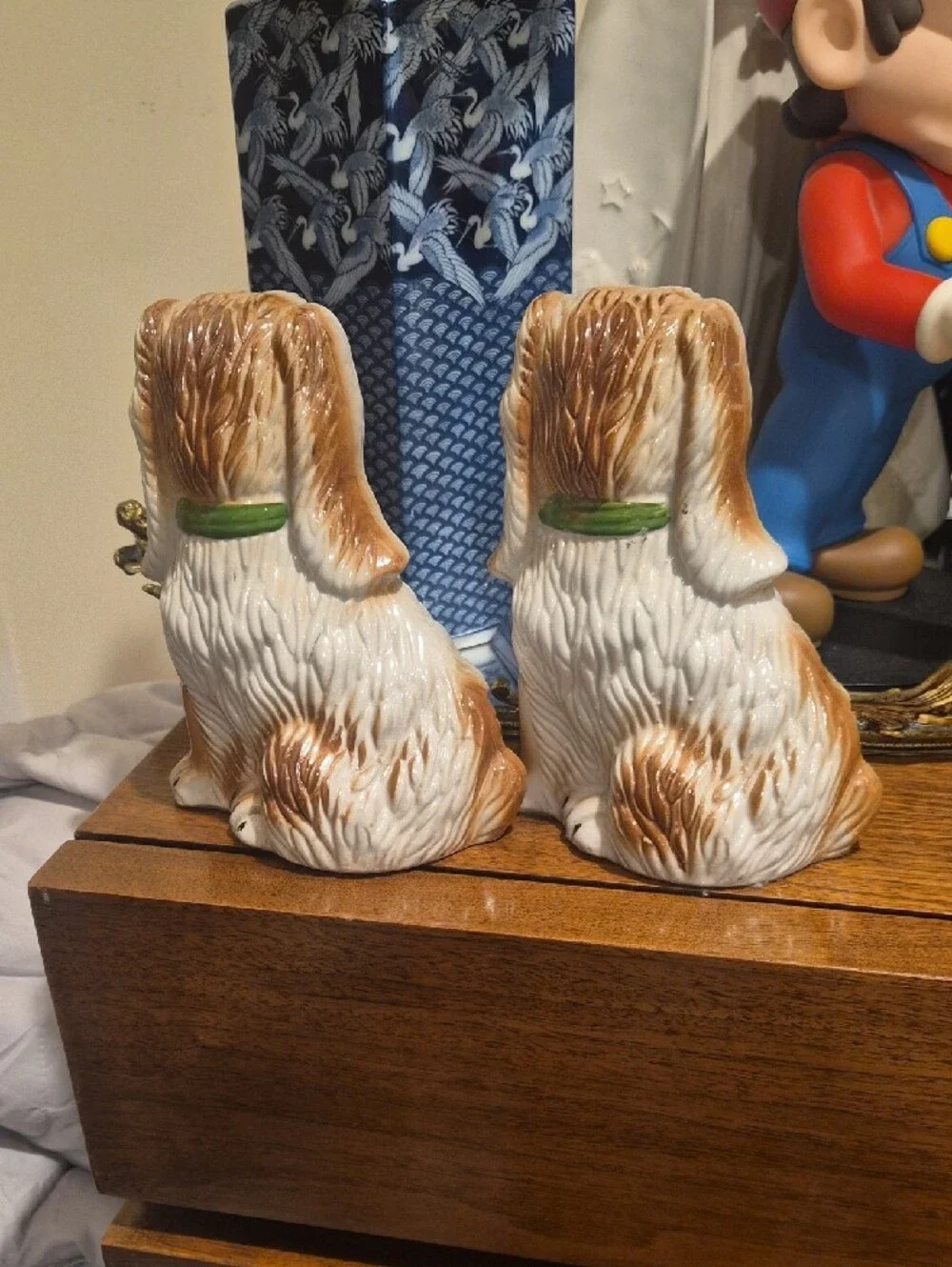 Pair of White and Brown Ceramic Dog Figurines with Green Collars